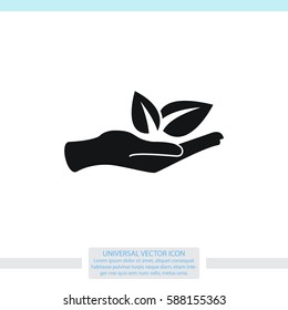 Sprout in a hand sign of environmental protection vector icon. 