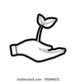 sprout in a hand sign of environmental protection. Vector. Flat style black icon on white.