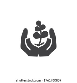 Sprout in a hand vector icon. filled flat sign for mobile concept and web design. Hands holding plant glyph icon. Environment protection symbol, logo illustration. Vector graphics