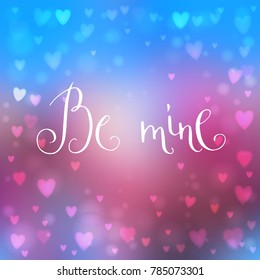 Square abstract blur blue and pink background with heart-shaped lights over it and hand written Valentine's day words.