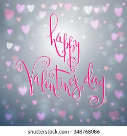 Square abstract blur grey background with heart-shaped lights over it and pink hand written Valentine's day greetings.