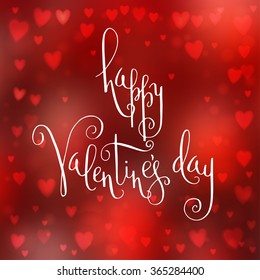 Square abstract blur red background with heart-shaped lights over it and hand written Valentine's day greetings.