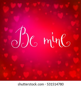 Square abstract red blur background with heart-shaped lights over it and hand written Valentine's day words.