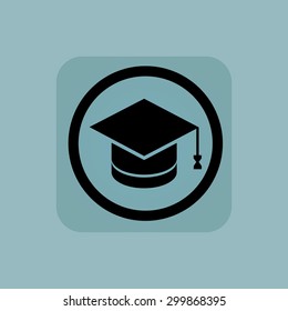 Square academic hat in circle, in square, on pale blue background