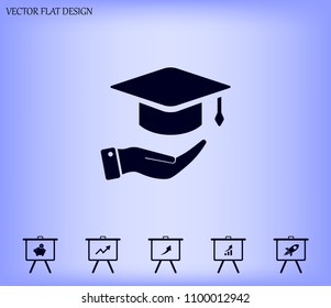 A square academic hat with a palm brush