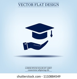 A square academic hat with a palm brush