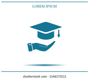A square academic hat with a palm brush