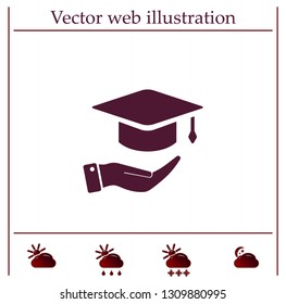 A square academic hat with a palm brush