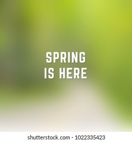 Square blurred winter background in blue and green colors with phrase spring is here