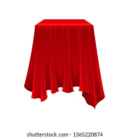 Square box under red silk cloth on white background.