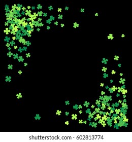 Square corner green frame, border or background of random scatter clover leaves. Elegant St. Patricks day design for festive banner, greeting card, postcard, flyer. Vector illustration.
