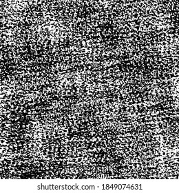 A square fragment of a worn floor carpet. Black and white image.