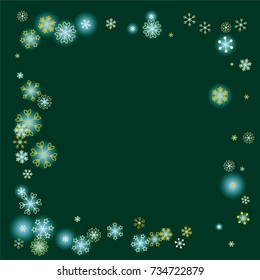 Square frame or border Christmas background with random scatter falling golden snowflakes and blue blurred lights on a dark green background.