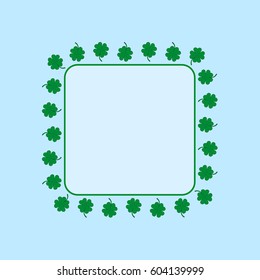 Square frame with green four-leaf clovers.