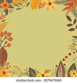 A square frame made of flowers and floral elements on green backdrop.