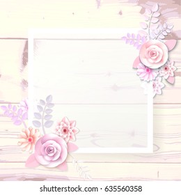 A square frame, a place for text with paper flowers, a petal on a wooden background. Can be used as a wedding invitation, birthday greeting card, engagement, thank you card.