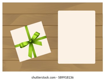 Square Gift Box with Green Bow and Sheet of paper Isolated on Wooden Plank Background.  Has place for your text. Vector image.