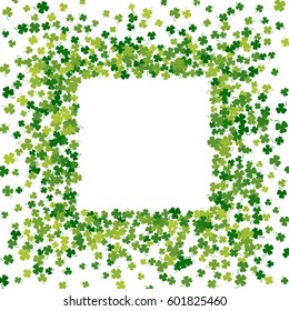 Square green frame, border or background of random scatter clover leaves with tails. Elegant St. Patricks day design for festive banner, greeting card, postcard, flyer. Vector illustration.