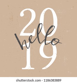 Square greeting card template with typographic design for 2019 in white and brown on craft paper background. Modern and minimalist postcard, social media post, blogging, poster design.