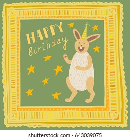 Square Happy Birthday card with hand lettering, hand-drawn golden frame and stars in background. Cheerful bunny wearing party hat.