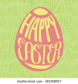 Square Happy Easter card. Pink egg with yellow hand written lettering decoration in egg shape. Green spring grass background.