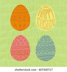 Square Happy Easter card. Set of colorful eggs with decorations and hand written lettering in egg shape. Yellow, red, blue, orange. Green spring grass background.