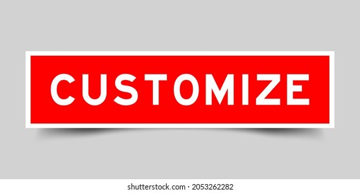 Etiqueta cuadrada con palabra personalizada en color rojo en fondo gris