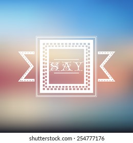 Square logo with text containing word "Say" in it on beautiful background of natural colors of sea on sunset