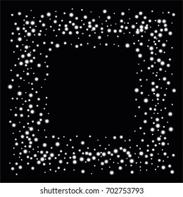 Square luminescent frame or border of a random scatter of white circles with a glowing effect, isolated on black.