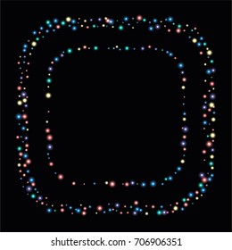 Square luminescent frame or border of a random scatter of rainbow circles with a glowing effect, isolated on black.