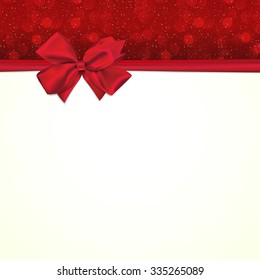 Square paper card with tied red bow and place for text.