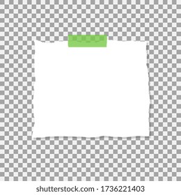 A square piece of paper attached with a piece of tape.