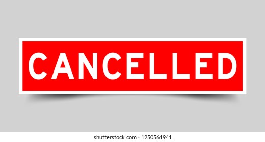 Square red color sticker with word cancelled on gray background