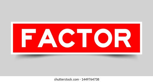Square red color sticker with word factor on gray background