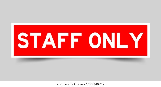 Square red sticker label in word staff only on gray background