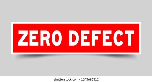 Square red sticker label in word zero defect on gray background
