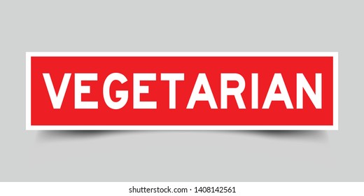 Square red sticker label in word vegetarian on gray background