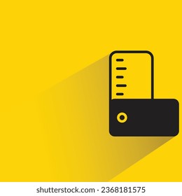 square ruler with shadow on yellow background