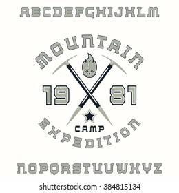 Square serif font with contour and expedition emblem. Color print on white background