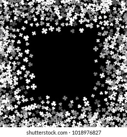 Square silver frame or border of random scatter clover leaves. Elegant St. Patricks day design for festive banner, greeting card, postcard, invitation, flyer, poster. Vector illustration.
