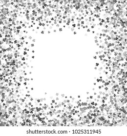 Square silver frame or border of random scatter clover leaves with tails. Elegant St. Patricks day design for festive banner, greeting card, postcard, invitation, flyer, poster. Vector illustration.