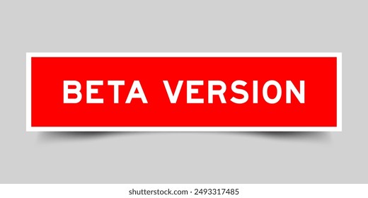 Square sticker label with word beta version in red color on gray background