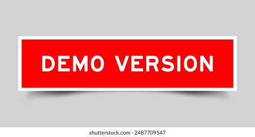 Square sticker label with word demo version in red color on gray background