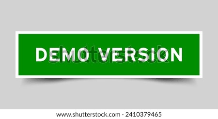 Square sticker label with word demo version in green color on gray background