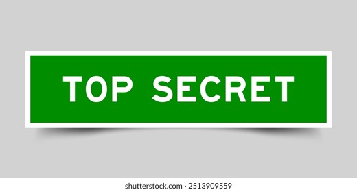 Square sticker label with word top secret in green color on gray background