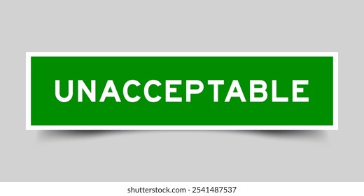 Square sticker label with word unacceptable  in green color on gray background