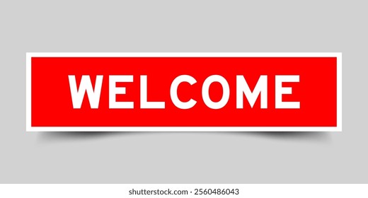 Square sticker label with word welcome in red color on gray background