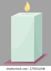 Una vela de cera cuadrada. Un solo objeto en forma de dibujo animado.