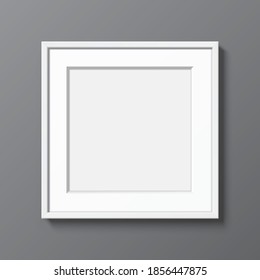 Square white frame with Passepartout hanging on a grey wall. Blank elegant frame template, with clear space, for art, image, or text placement. Picture frame in the gallery, realistic vector mockup.