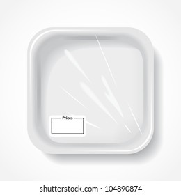 A square white plate with space for a price tag on a white background